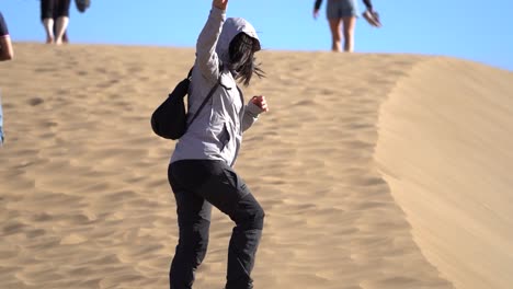 Dune-against-seascape,-desert-near-seashore