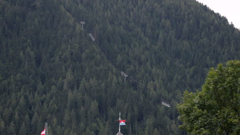 RopeWay-cabines-Moving-Upwards-To-Top-Of-Mountain-Herzogstand-in-Germany