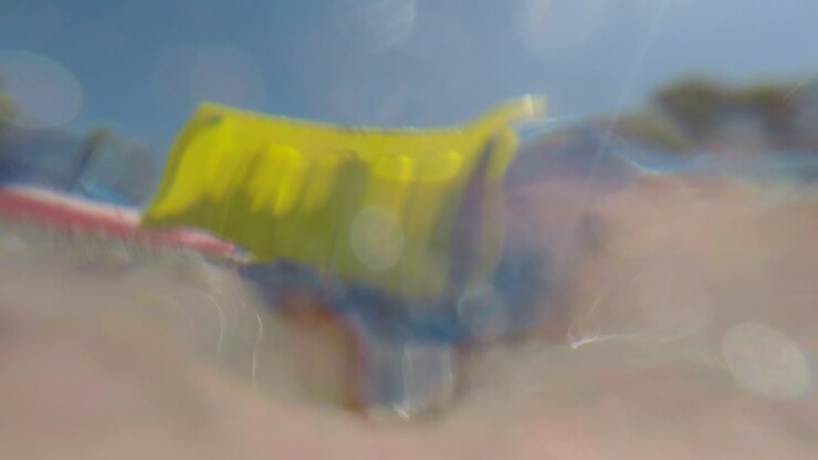 Toy truck hit by the waves at Kalamata beach,Greece