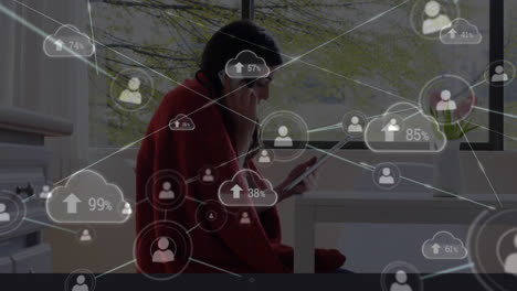 animation of data processing with cloud icons over caucasian woman using smartphone