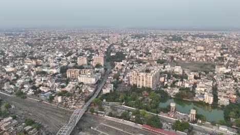 high-angle shot of varanasi's tightly packed buildings and narrow lanes, a testament to the city's ancient roots and deeply intertwined communities.