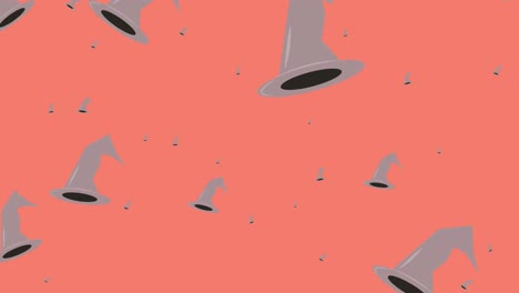 animation of falling witchs hats on pink background