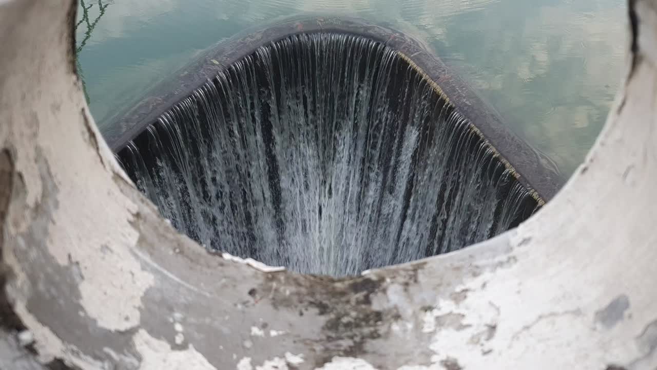 Waterfall flowing from the dam. file 1