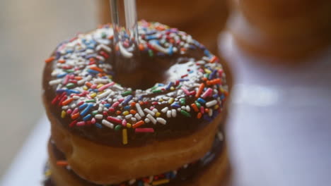 Stack-of-chocolate-sprinkle-covered-doughnuts