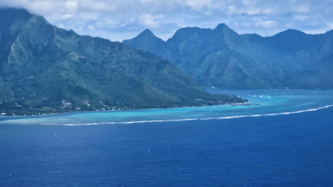 Moorea Island French Polynesia Picturesque Coastline, Lagoon and Volcanic Hills, Airplane Passenger POV