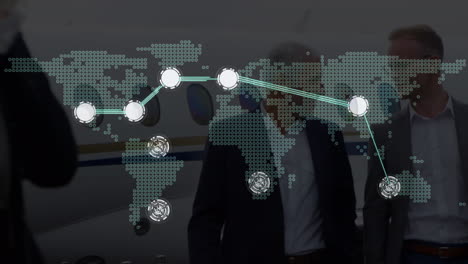 connecting dots over world map over two caucasian businesmen talking to each other at airport runway