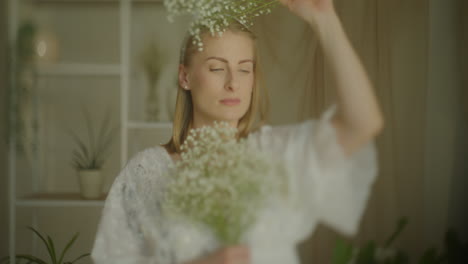 pregnant woman with baby's breath bouquet