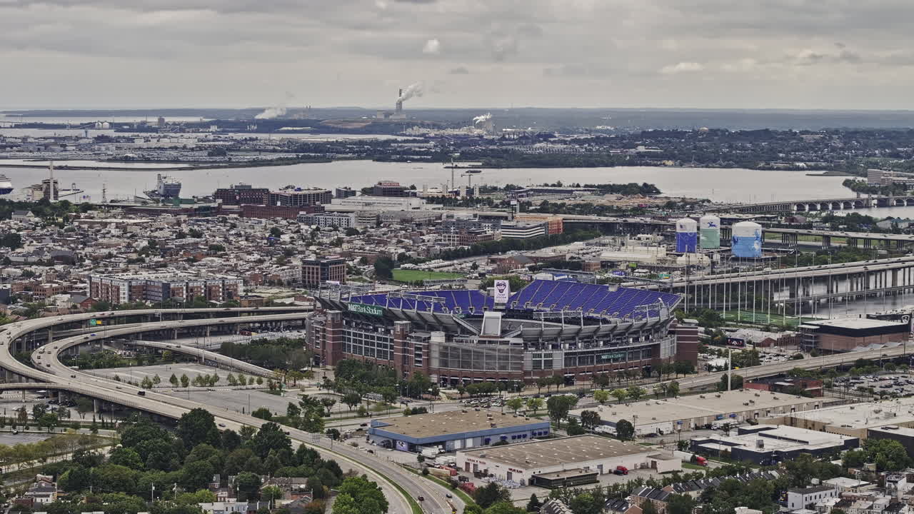 Baltimore Maryland Aerial v113 zoomed flyover University campus capturing urban cityscape, stadium, freeway, views of Patapsco river and industrial areas - Shot with Mavic 3 Pro Cine - Sept 29th 2023