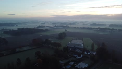 Sunrise-in-Helmond-city-with-the-birds-flying-across