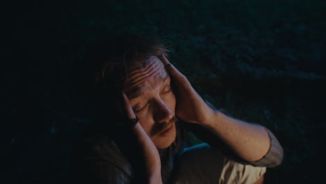 man in distress at night