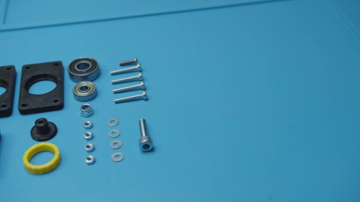 Pan Right Small Parts Prepared For Assembly Blue Background