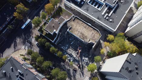 aerial view of building demolition in city