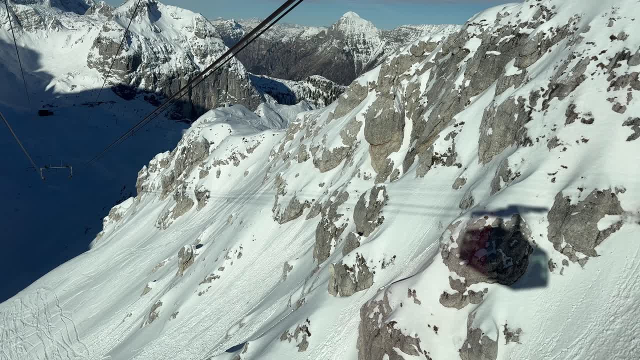 Moving Cable Car shadow in the Italian Alps