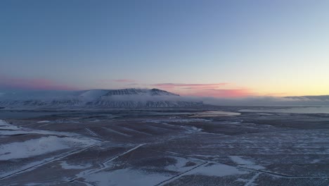 Iceland-Aerial-View-Flying-Slow-Above-County-Fields-In-Winter