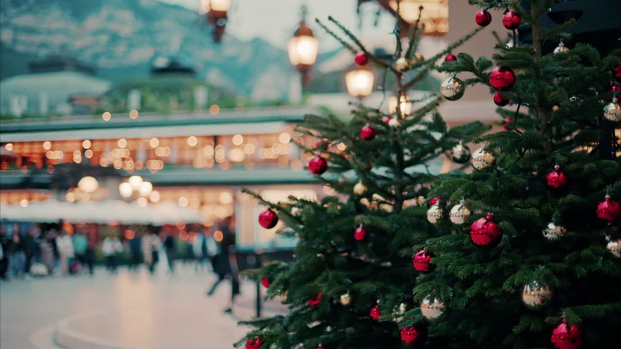 Close up of decorations on a Christmas tree in front of the Monte Carlo Casino in Monaco