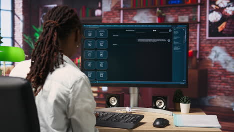 woman seated at desk using ai llm chatbot software in modern urban home office