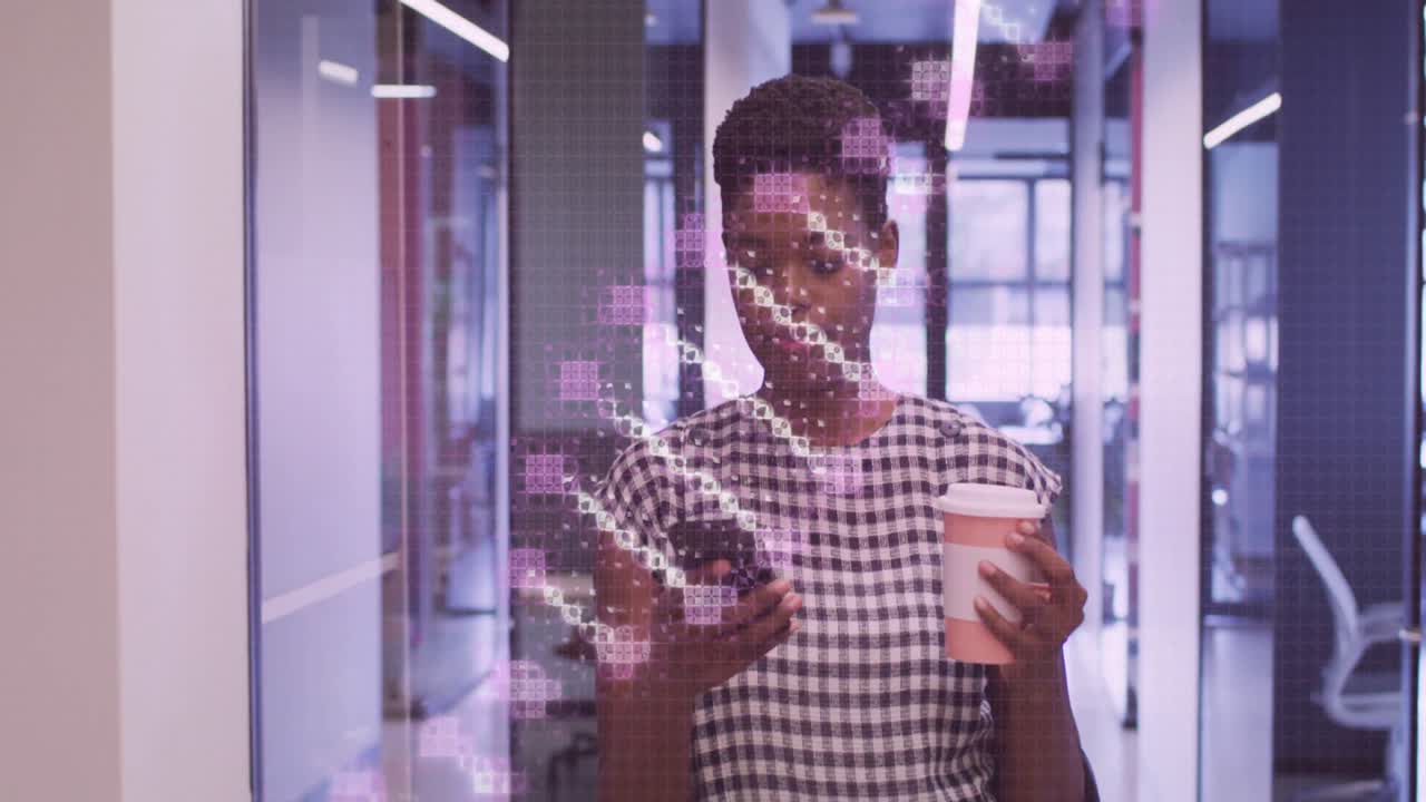 Animation of dna strand over african american businesswoman