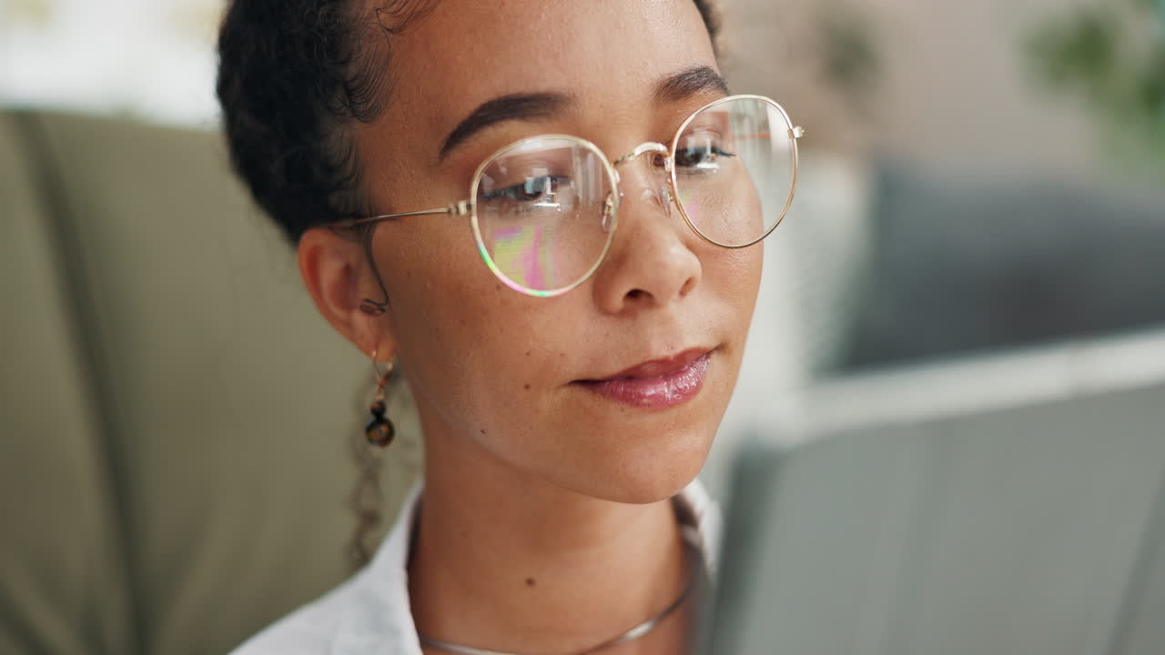 Woman Concentrating on Computer