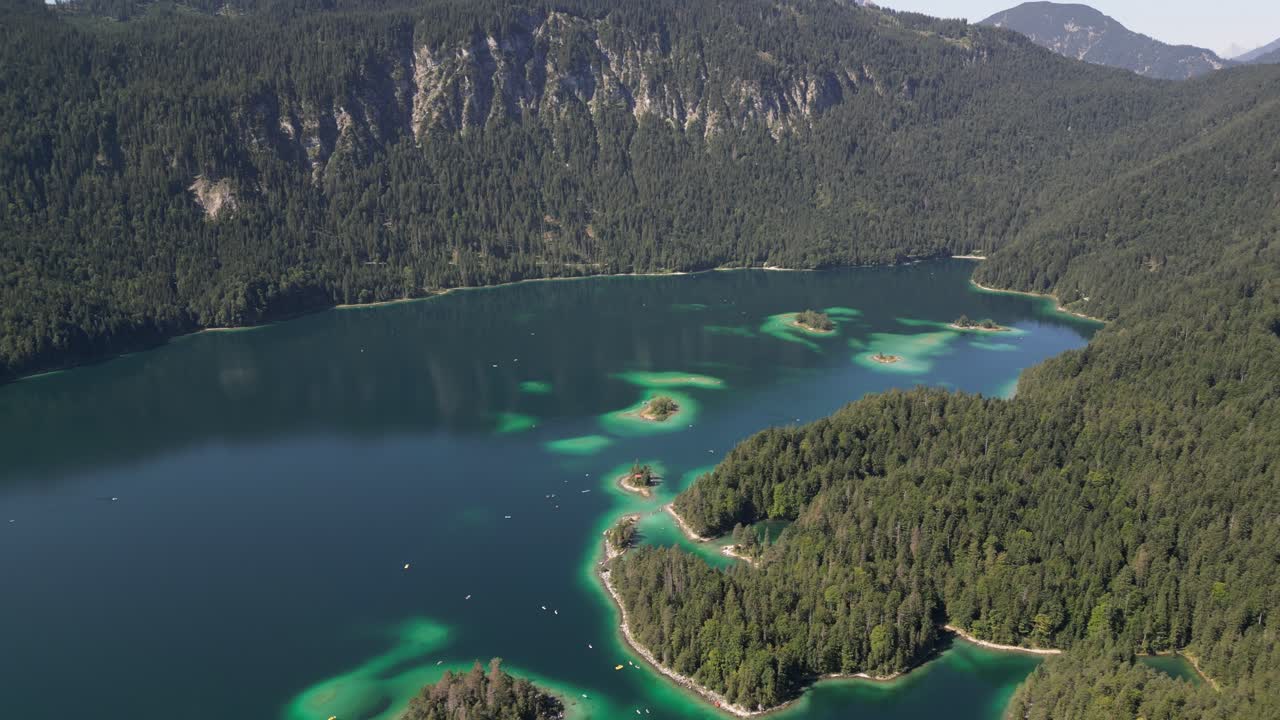 Rock cliff in Eibsee Bayern Deutschland Bavaria Germany Nature and colorful lake provide wonderful outdoor hiking travel to pine tree forest in highlands with fresh air and calmness relaxing leisure