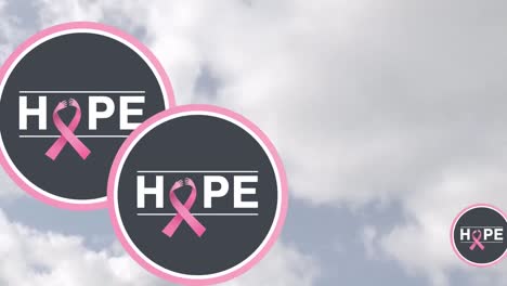 animation of pink ribbon and hope text over cloudy sky