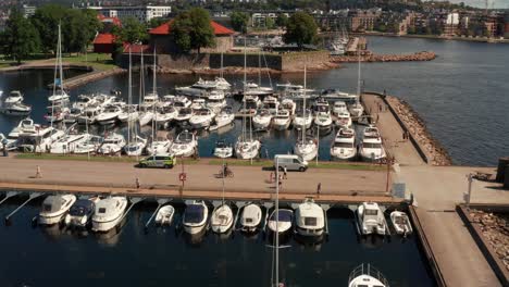 boats in the harbour of kristiansand in norway