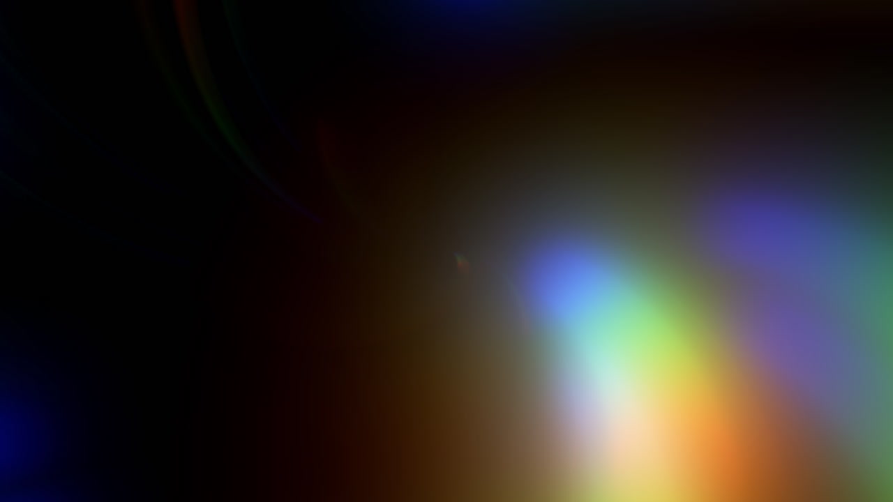 un flash lento, hermoso y colorido de la lente del arco iris, que se mueve desde la parte superior izquierda a la parte inferior derecha de la pantalla, convirtiéndose en un resplandor blanco en el centro