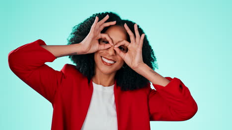 face, fun and finger glasses with a black woman