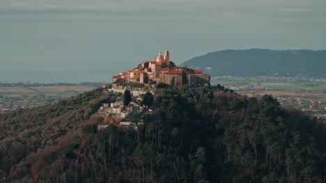 circling right aerial of nicola, italy, hilltop village overlooking the sea