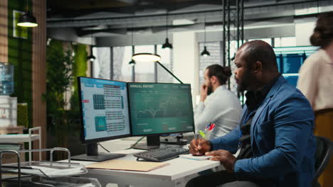 vertical video black employee building new development strategy with notes