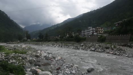 Himalaya-mountainous-river-Ganges-flowing-through-Himalaya-villages---cities-in-Uttarakhand,-India