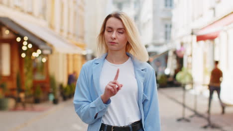 Displeased-upset-woman-reacting-unpleasant-awful-idea-dissatisfied-with-bad-quality-shake-finger-No