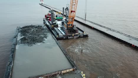 Dredging-operation-in-Kewaunee-Harbor-on-Lake-Michigan,-Kewaunee,-Wisconsin-8