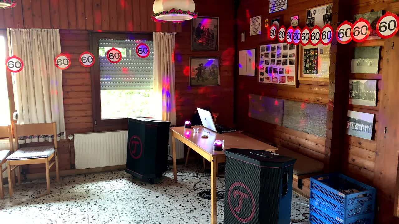 Dj equipment with table, laptop, lights, music boxes and turntables. Birthday party