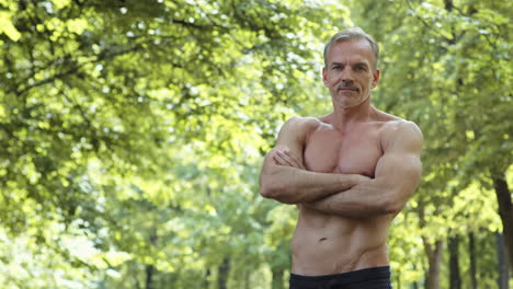 muscular man in a park