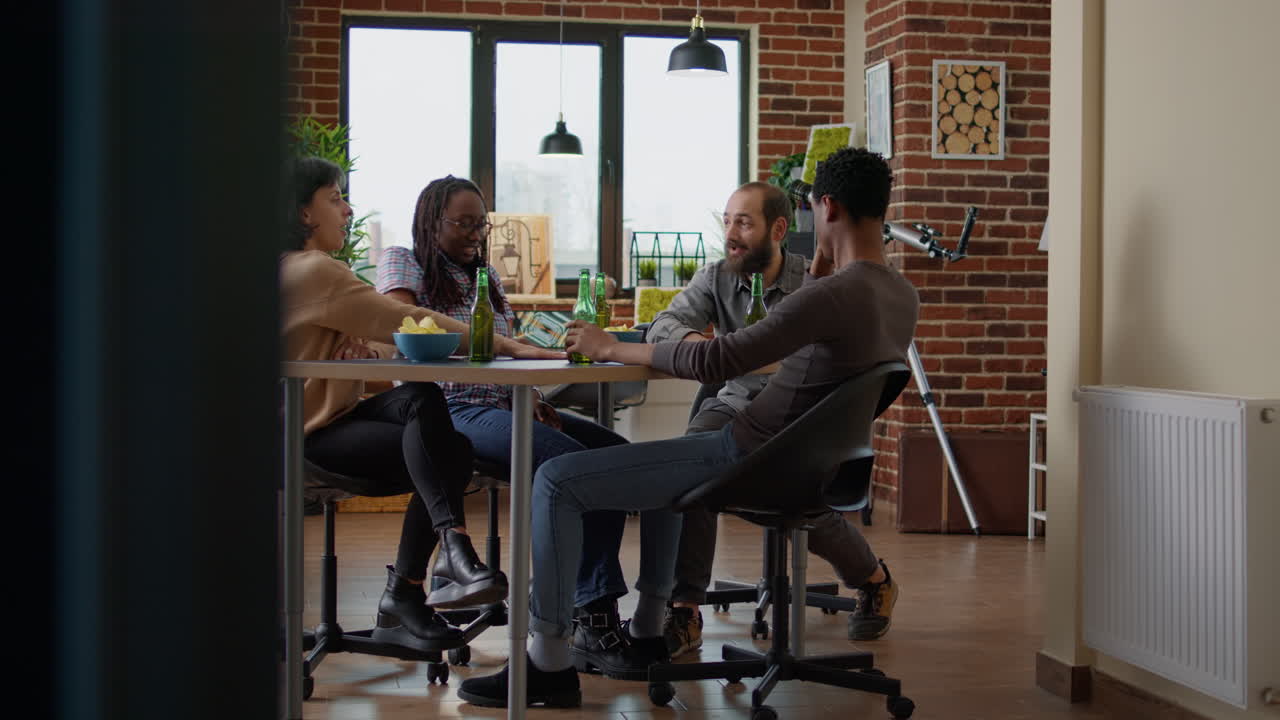 Diverse group of friends having fun together with card games