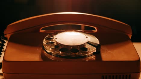 retro vintage phone, a yellow rotary telephone is displayed on a wooden desk, adding a nostalgic touch