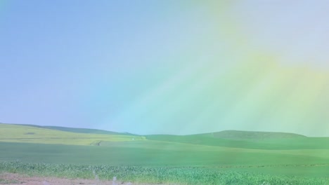 video of rainbow fog over moving countryside landscape