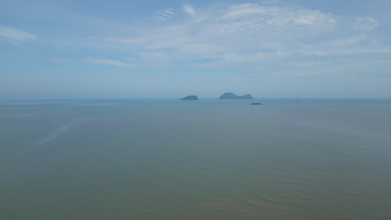 Serene Ocean Landscape with Distant Islands