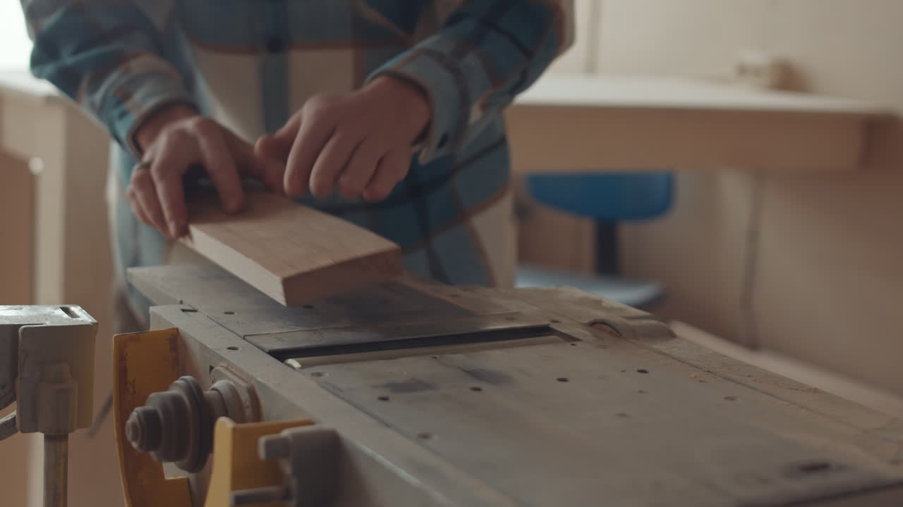 Unrecognizable Carpenter Using Wood Router