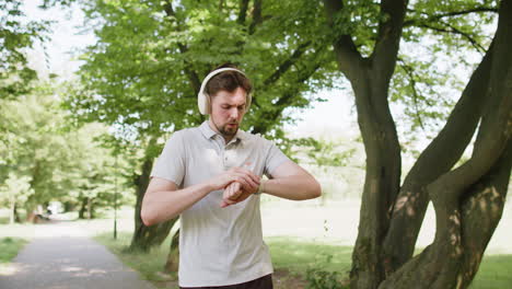 man running through a park