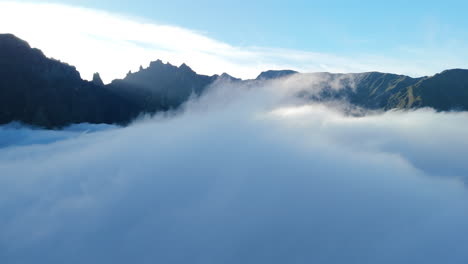 flying through and above clouds in high mountain landscape of madeira islands outdoor nature, portugal