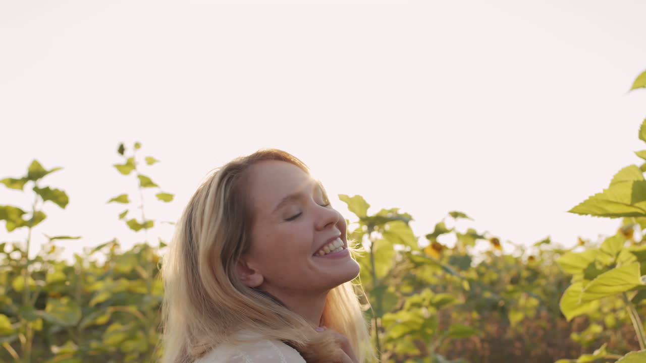 Joyful Woman In Sunflower Field
