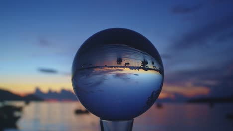 timelapse magic sunset inside crystal ball.