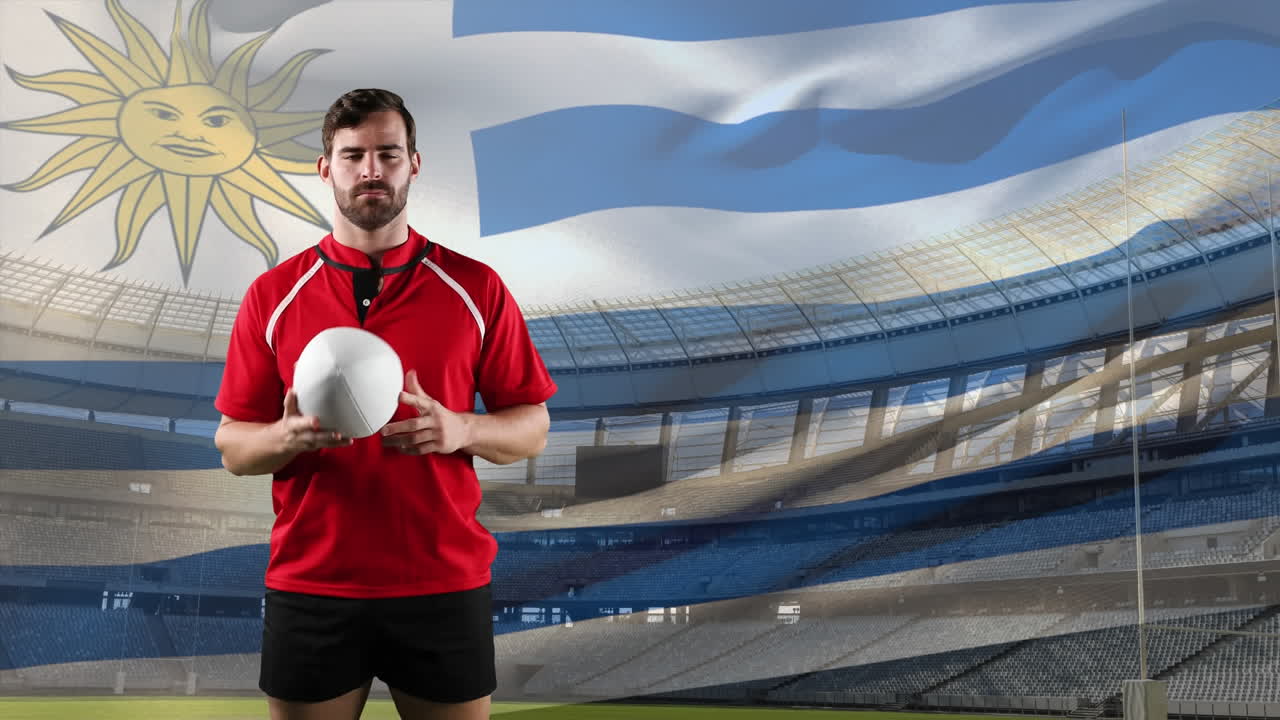 jugador de rugby profesional de pie frente a una bandera y un estadio