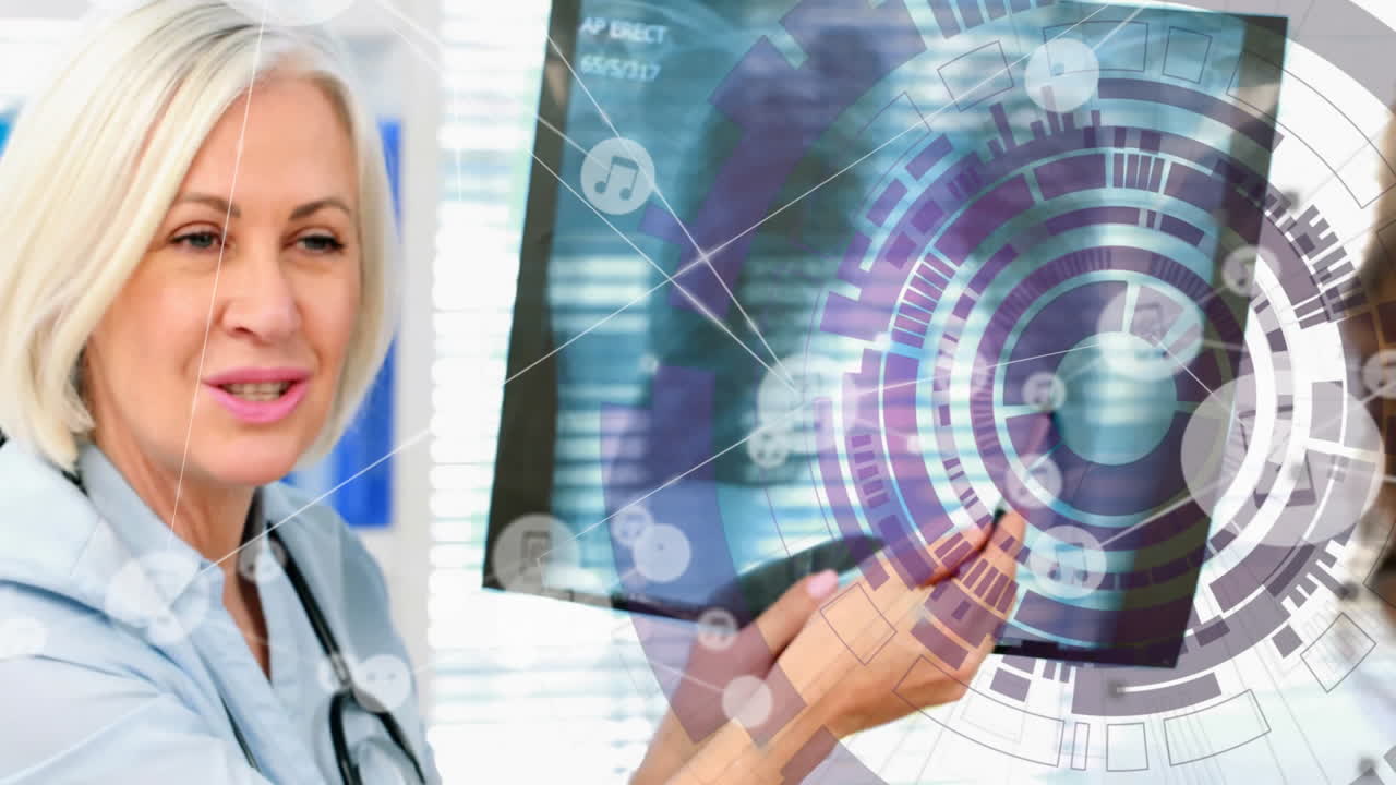 Medical doctor holding and examining X-ray film with patient in clinic overlaying circular graphics