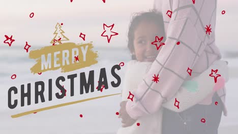 Animation-Eines-Frohe-Weihnachts-Textes-über-Biracial-Mutter-Und-Tochter-Am-Strand