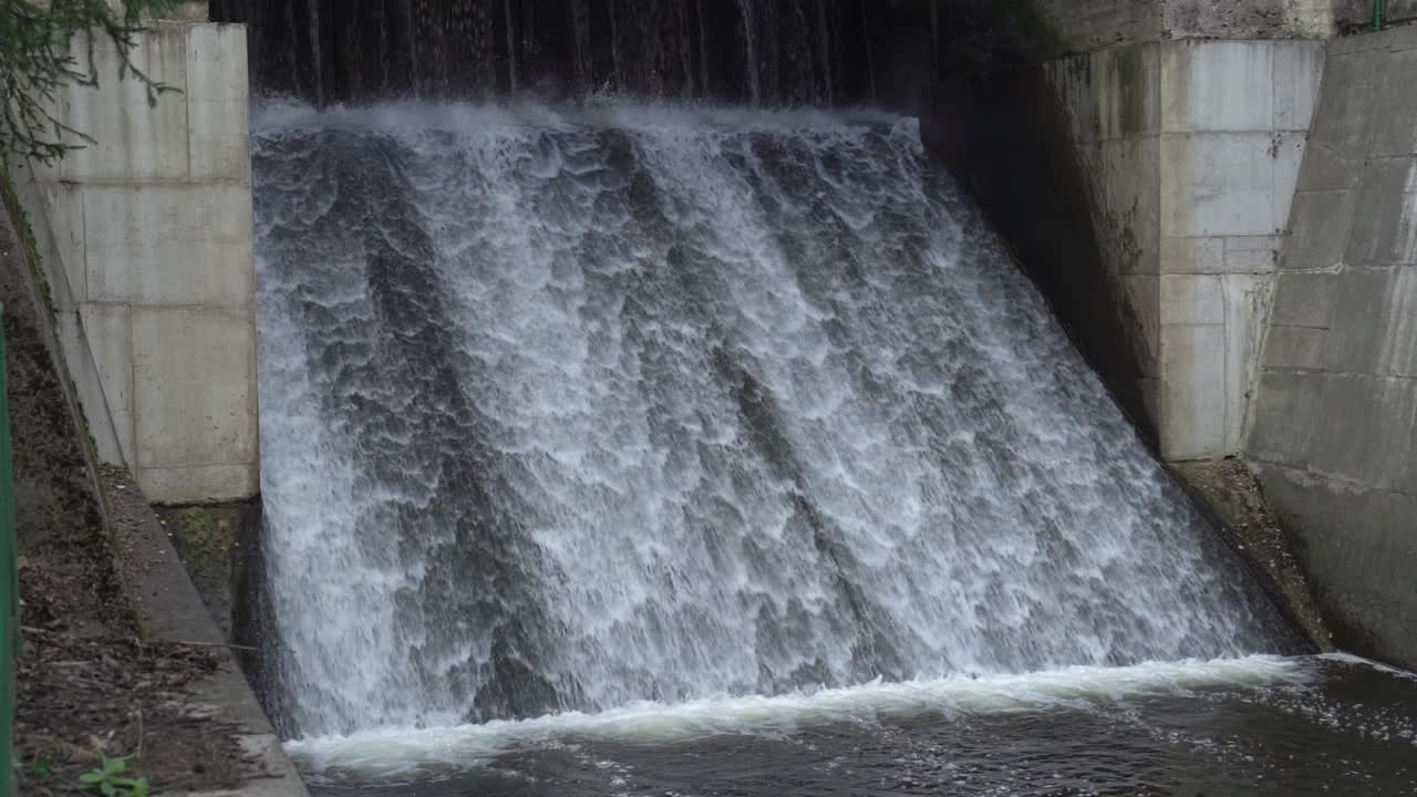 Flow of water on the dam of Saesaare hydroelectric plant in slow motion