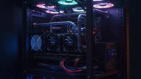 a detailed view of a custom gaming pc setup, featuring dual graphics cards, advanced cooling systems, and led lighting for enhanced performance and aesthetics