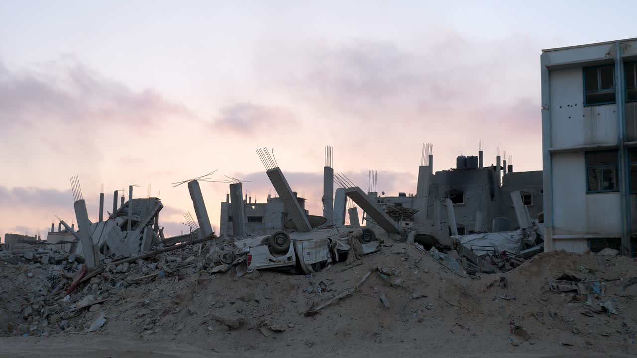 Damaged houses and damaged car after Israeli settlers attacked Israeli soldiers and a Palestinian vehicle near a recently destroyed illegal outpost in the occupied West Bank
