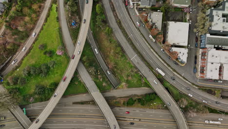 Portland-Oregon-Aerial-v105-vertical-flyover-Goose-Hollow-Foothills-League-capturing-Interstate-Route-I-405-and-Highway-26,-traffics-passing-through-hill-tunnels---Shot-with-Mavic-3-Cine---August-2022